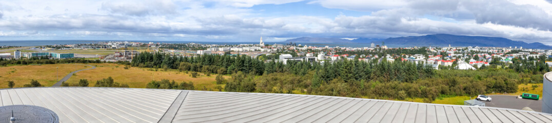 Panoramic aerial view of Reykjavik from a city rooftop in summer season