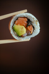 sushi with chopsticks