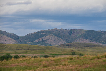mountain landscape with blue sky and clouds