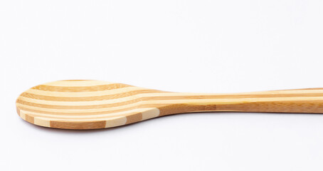 Wooden spoon on White background