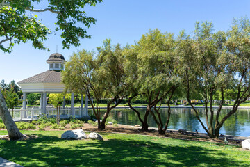 Gazebo next to lake in park