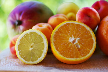 Sliced lemon and orange. Fruits on table