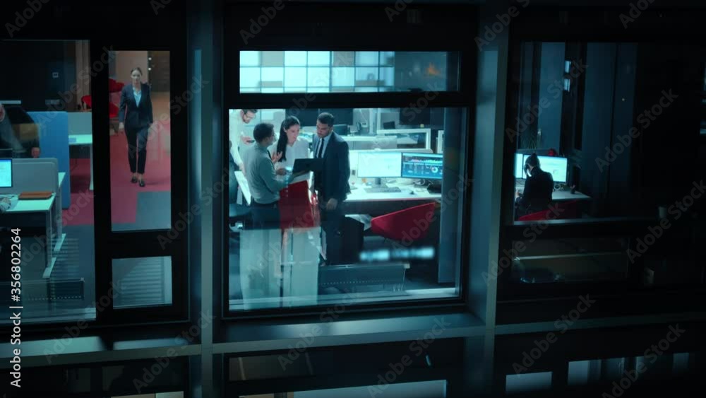 Poster footage from outside the window: daily meeting in the office. senior manager explaining new business