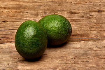 avocado on a old wood background. tinting. selective focus