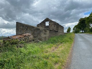 Fototapeta na wymiar Old farmhouse ruins on the road to Lothersdale, Keighley, UK