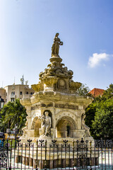 Fototapeta na wymiar The closeup image of Flora Fountain It was built in 1864 at the Hutatma Chowk (Martyr's Square), is an ornamentally sculpted architectural heritage monument located in South Mumbai india. 
