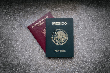 Two passports from different countries, Mexican passport and Romanian passport