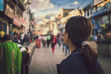 young woman walking on the city 