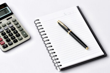 Work space on white desk with equipment office of note book, pen, calculator, Top view and copy space