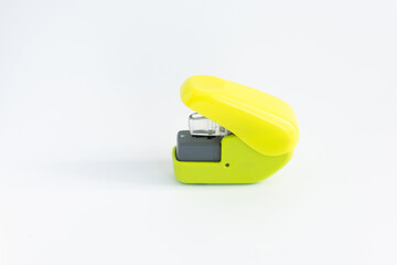 Small stapler on white background.