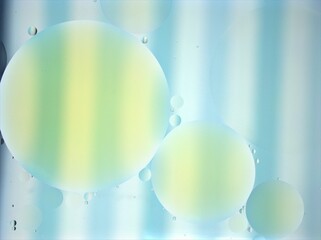 Beautiful bubbles oil with colorful white blue background ,dropslets macro image ,abstract background, sweet pastel color for card design
