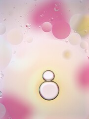 Beautiful bubbles oil with colorful white pink background ,dropslets macro image ,abstract blurred background, sweet pastel color for card design, valentine day