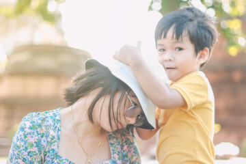 Obraz premium Happy happy family Mother and boy play kiss and hug