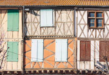 Fototapeta na wymiar Colored wall of the old house in the tudor style