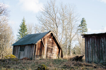 Typical Swedish wooden sheds in the countryside, sunny day, spring in Sweden