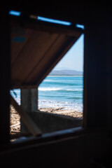 Summer, travel, vacation and holiday concept - the open window, with sea view