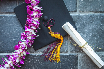 graduation cap, lei and diploma 2020