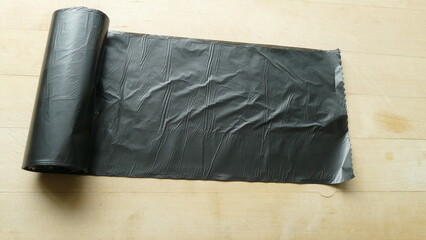 a roll of plastic bags for garbage collection