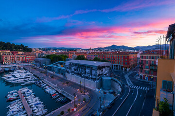 Dramatic gorgeous sunrise over the quiet town of Nice, France