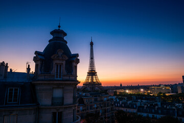 Fototapeta na wymiar Sunrise of Paris with the view of Eiffel Tower and city of Paris, France