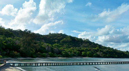 
On the shores of the sea there is a beautiful blue sky, golden sand and the sea breeze.
