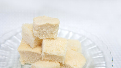 Diced white bread cubes in a glass plate 