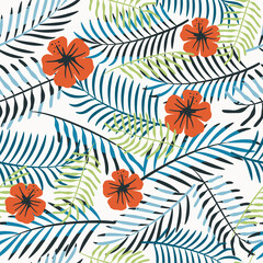 Vector seamless pattern with palm leaves and tropical flower