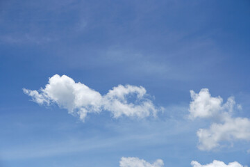 Naklejka na ściany i meble Clouds floating in the blue sky