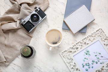 Flat lay composition with cup of coffee on white background