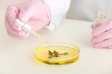 Beautician preparing natural cosmetic, closeup