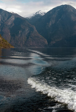 Fjord and a backtrace of a boat