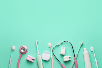 Set for oral hygiene with stethoscope on color background