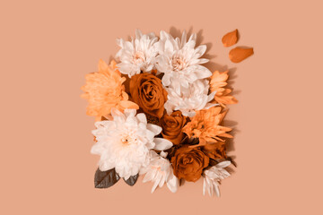 composition of roses and chrysanthemums toned on beige background