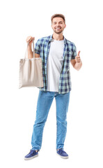 Young man with eco bag on white background