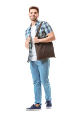 Fototapeta premium Young man with eco bag on white background