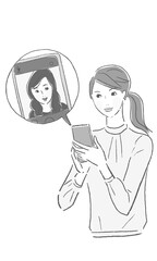 A woman having a conversation over a mobile phone