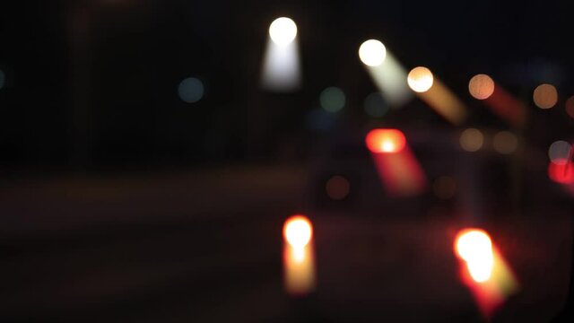 night cars on the road traffic blurr defocus. Movement of cars on the motorway