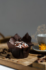 cup of coffee on the table with cupcakes