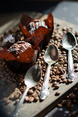 chocolate cupcake with sprinkled coffee beans on the table