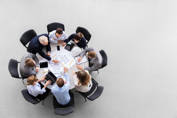 construction business, architecture and building concept - group of architects with laptop computer...