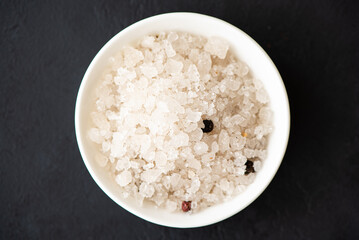 spices for cooking - large sea salt with pepper close-up