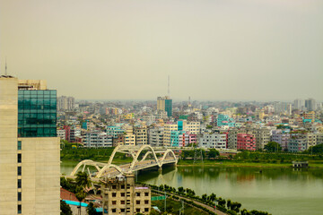 Dhaka city, Bangladesh - view of the Hatirjheel lake with the buildings at the background from the capital of Bangladesh