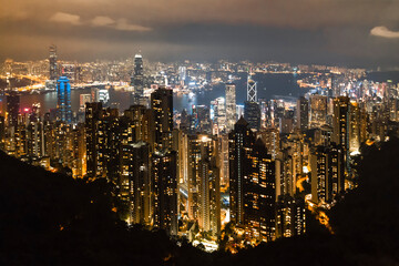 Aerial night view of Victoria Bay at the top of Tianping Mountain at sunset in Hong Kong, China