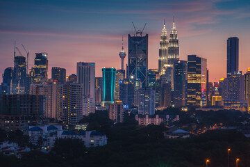 Evening view of the Kuala Lumpur Twin Towers and KL Tower city skyline, Malaysia