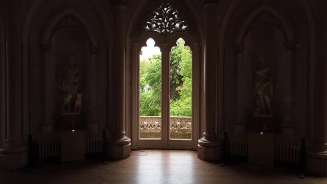 Palace window with view to the garden.