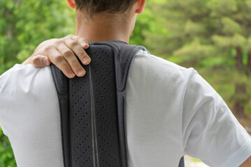 Back brace, lumbar corset. Back pain concept