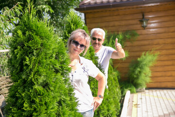 A middle-aged couple amid the green