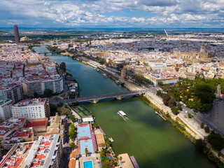 Obraz premium Aerial view Sevilla of city center with embankment of Guadalquivir. Spain