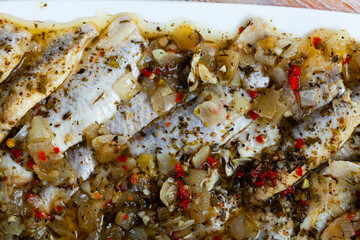 Closeup of spicy pickled herring