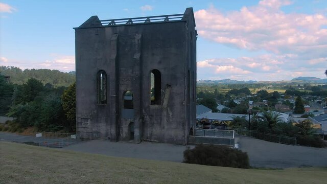 Aerial: Cornish pumphouse at  Martha Open Pit Gold Mine. Waihi, New Zealand